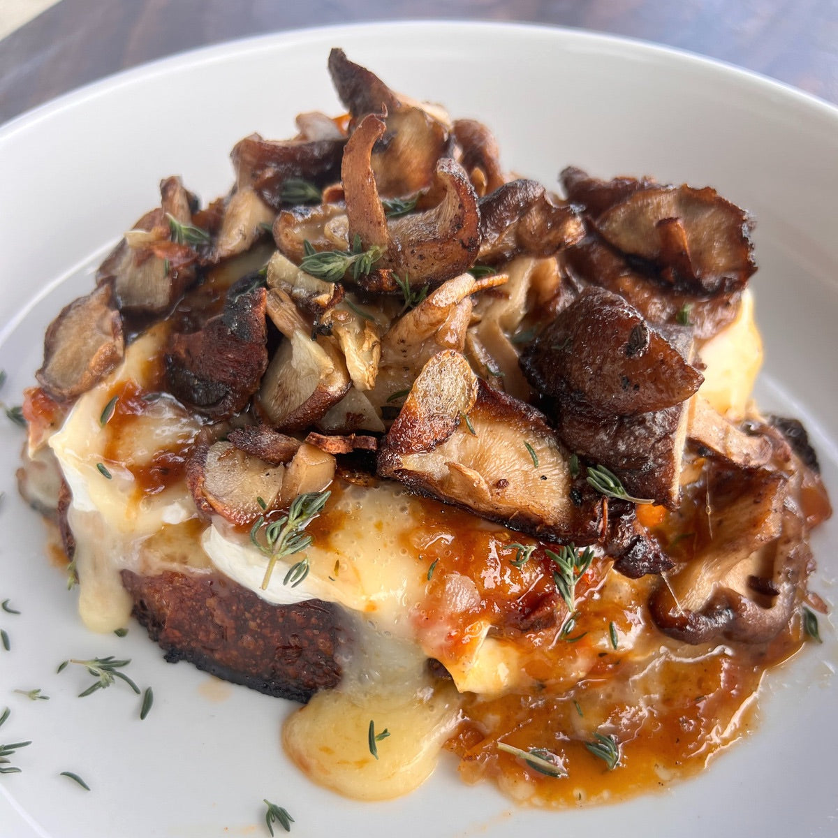 grilled mushrooms with brie on toast with tomato-onion jam