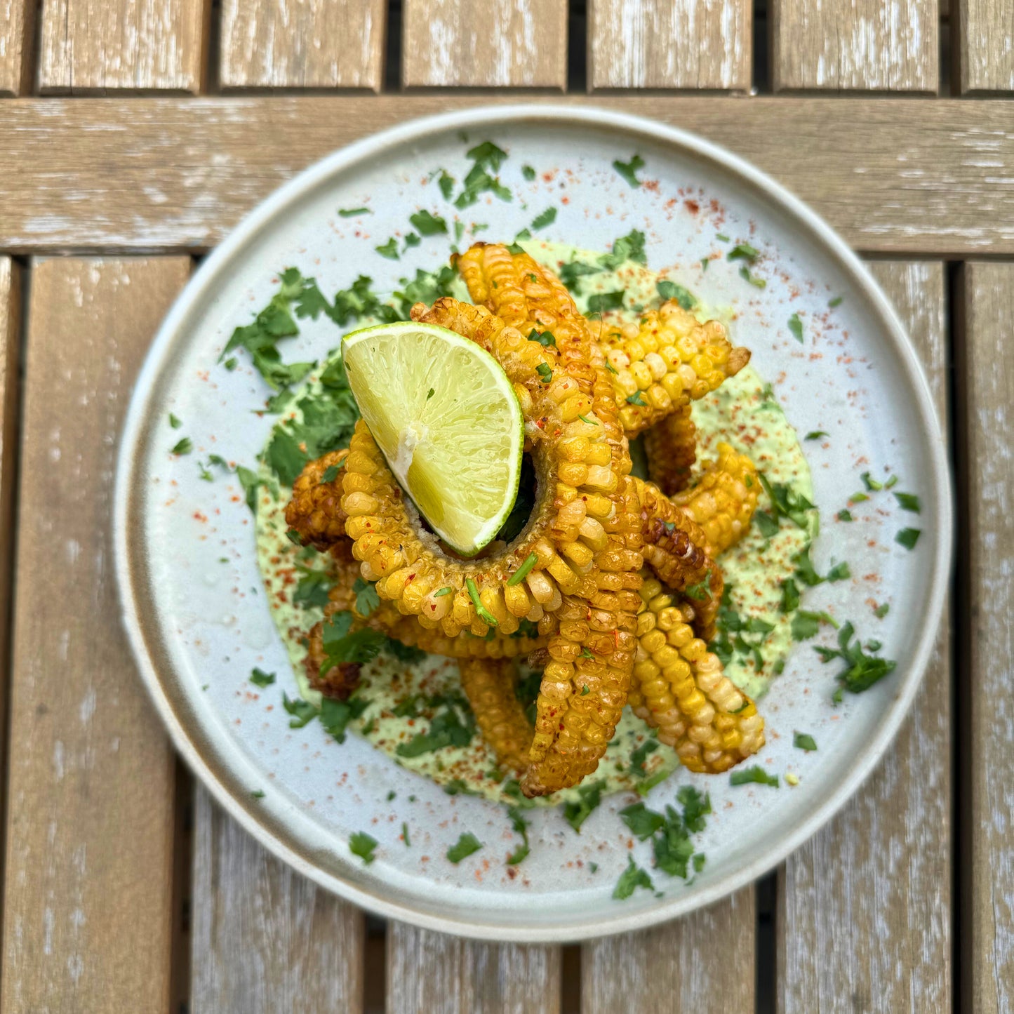 smoked and fried corn ribs with charred poblano crema