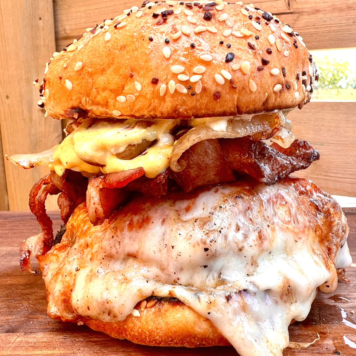 Alchemy Grills fire-grilled bacon banquet burger
