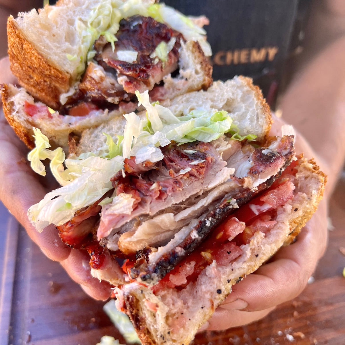 smoked pork belly, lettuce and tomato sandwich 