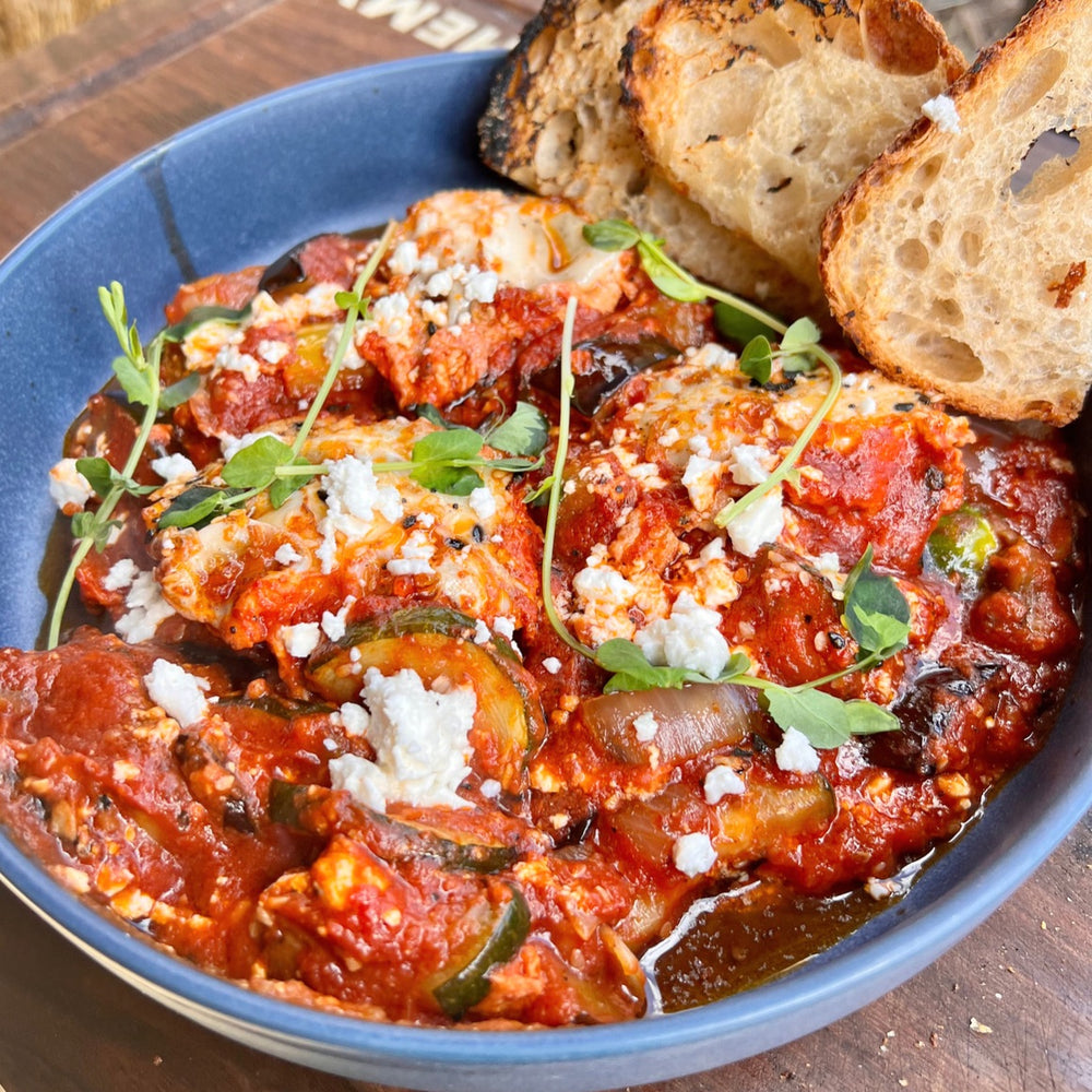 smoked shakshuka with eggs and crumbled feta