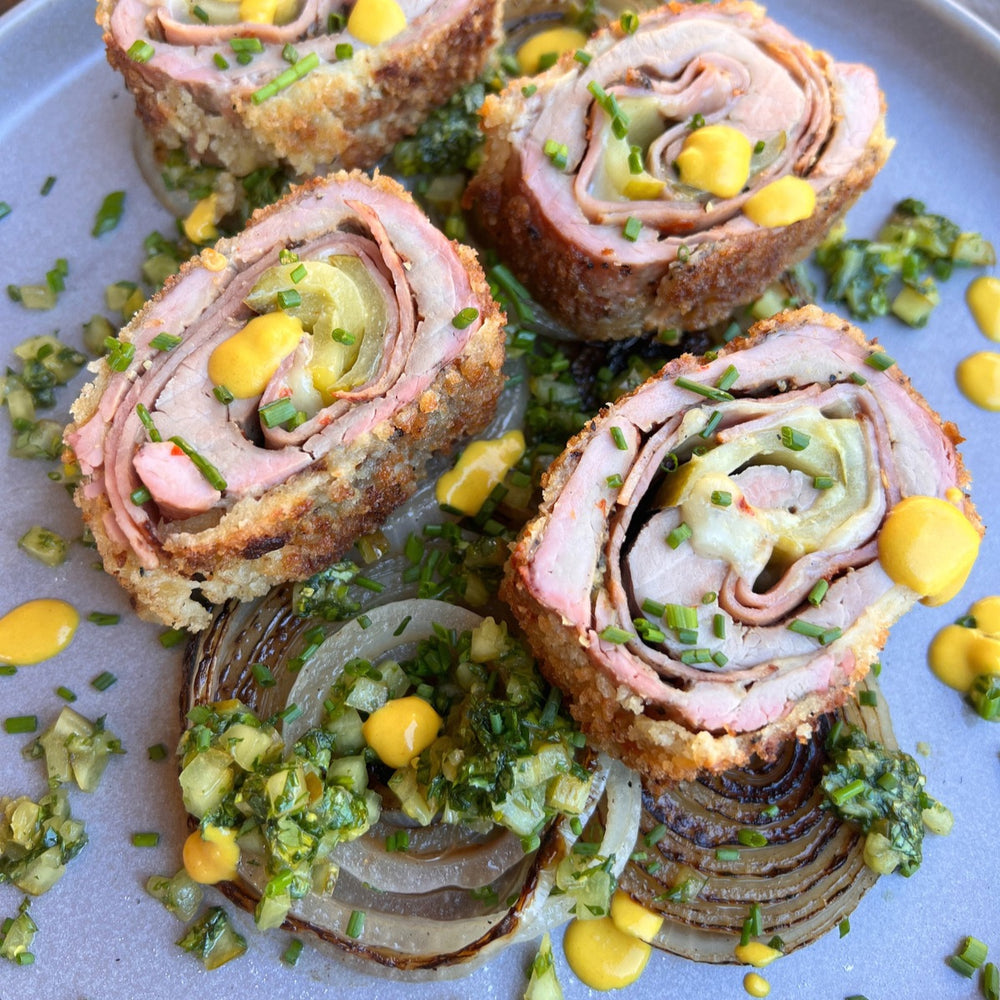 smoked cubano-style rolled pork tenderloin with grilled onions