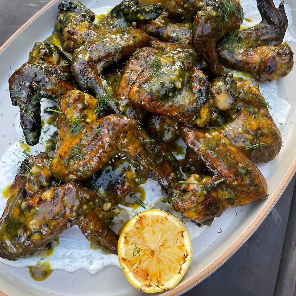 smoked hot and honey mustard wings with dill ranch sauce 