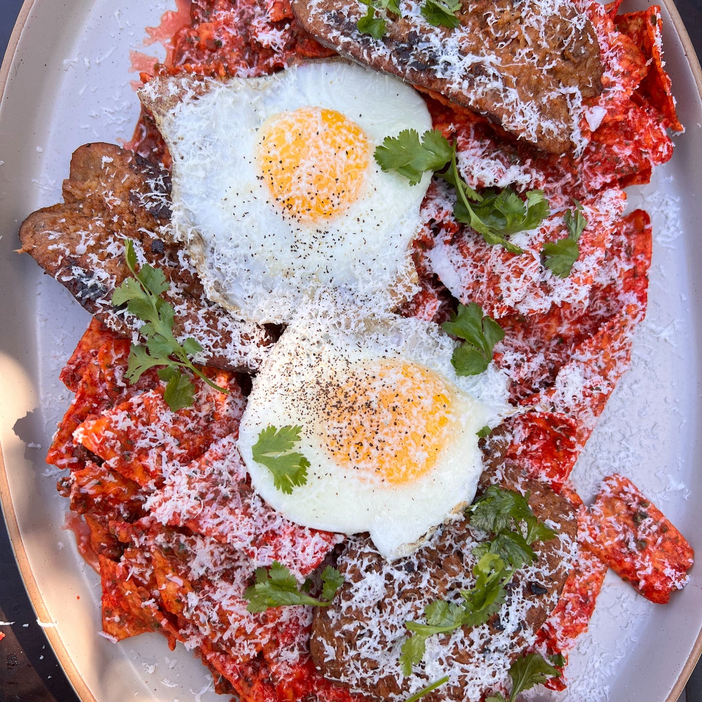 chorizo and egg chilaquiles with flaming hot Doritos