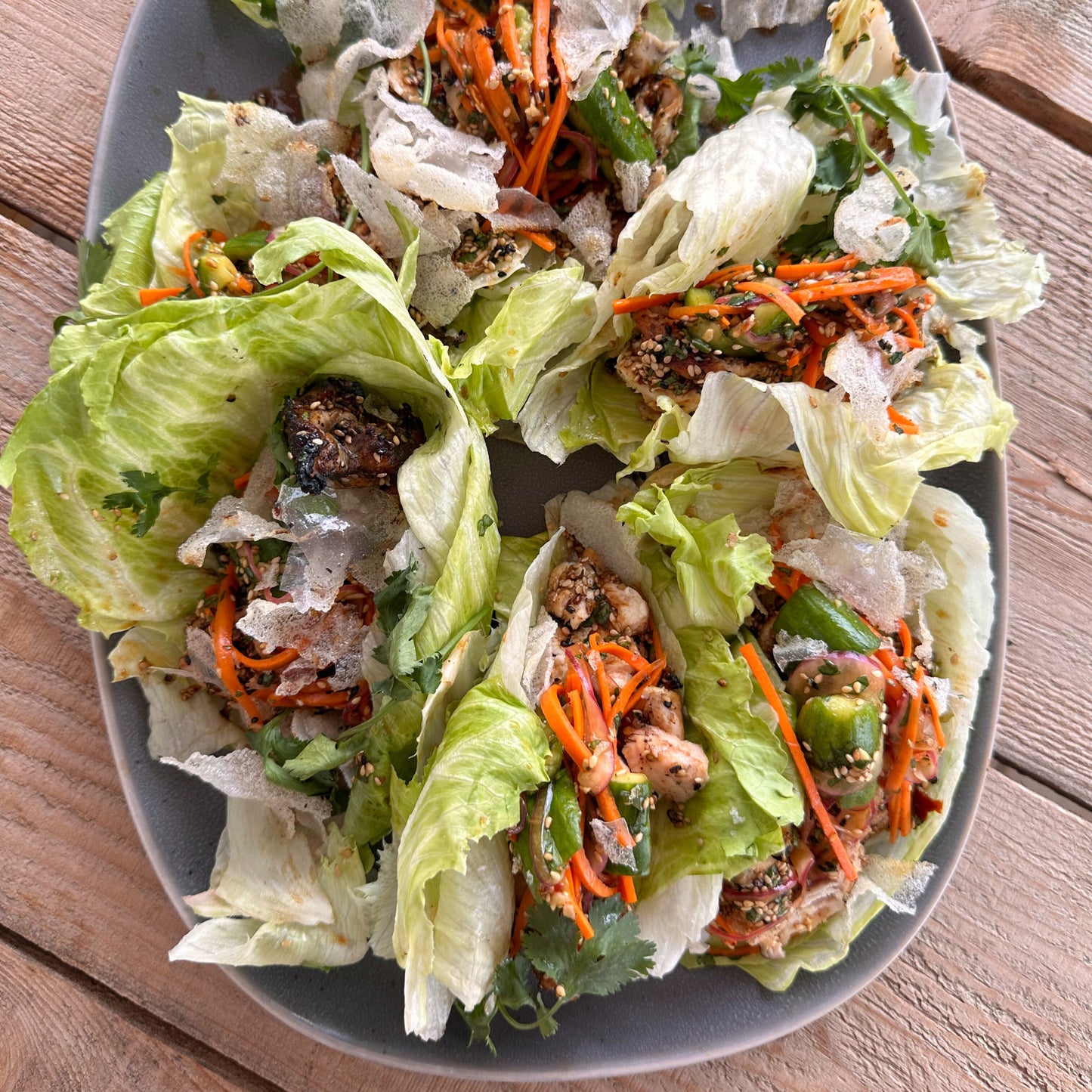 smoked chicken lettuce wraps recipe with carrots and cucumber slaw 