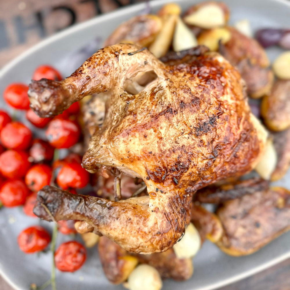 rosemary-butter rotisserie chicken with smashed fingerling potatoes