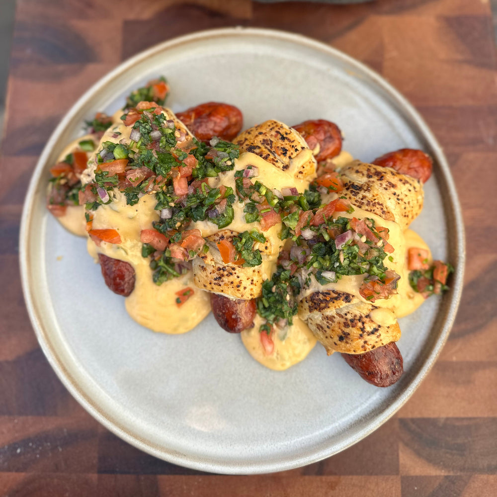 chorizo sausage rolls with queso fundido and pico