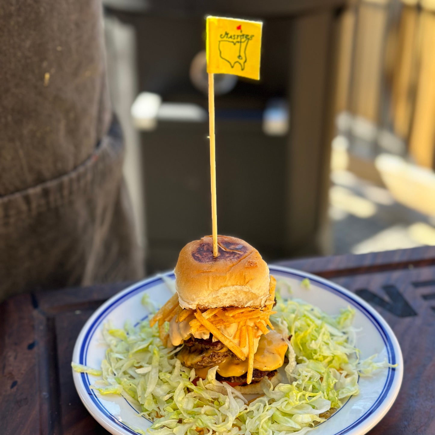 A slider with a Masters flag skewer sticking out the top