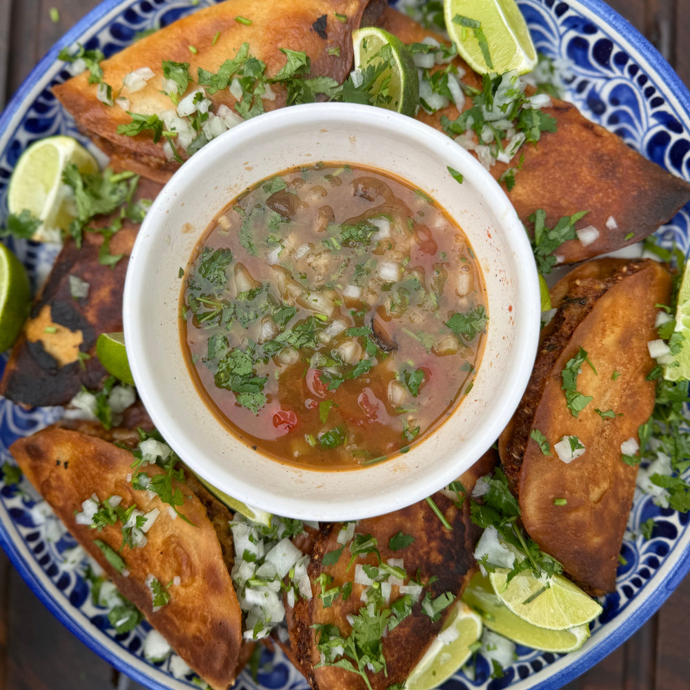 Crispy shrimp tacos with a tom yom dipping broth