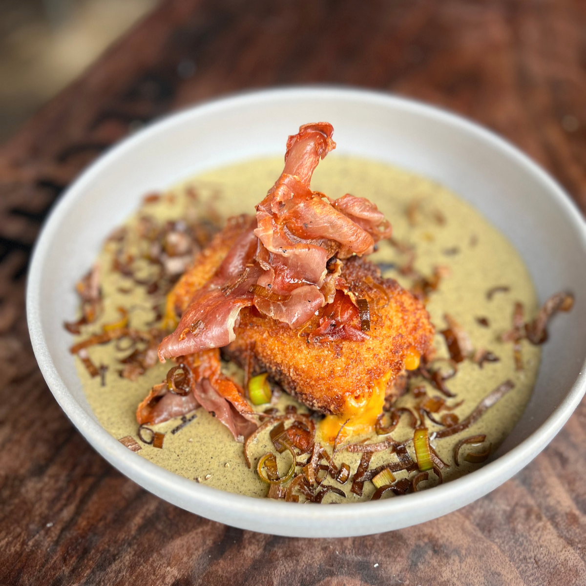 Smoked Broccoli Soup with Crispy Fried Panko Cheddar, Prosciutto and Leeks